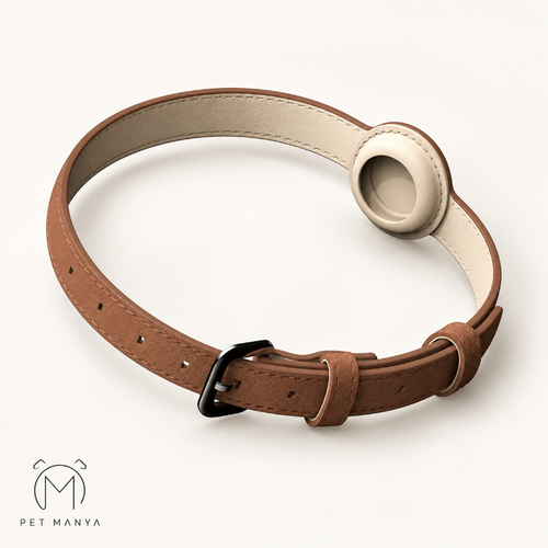 A brown leather pet collar with a cream-colored inner lining, a black metal buckle, and a circular beige insert, displayed on a clean off-white background with the Pet Manya logo in the bottom-left corner.