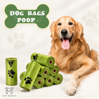 A golden retriever dog is lying on a white studio background next to several rolls of green dog poop bags, with one upright roll showing black paw prints. A green bone-shaped sign at the top reads “DOG BAGS POOP,” and the Pet Manya logo appears at the bottom left.