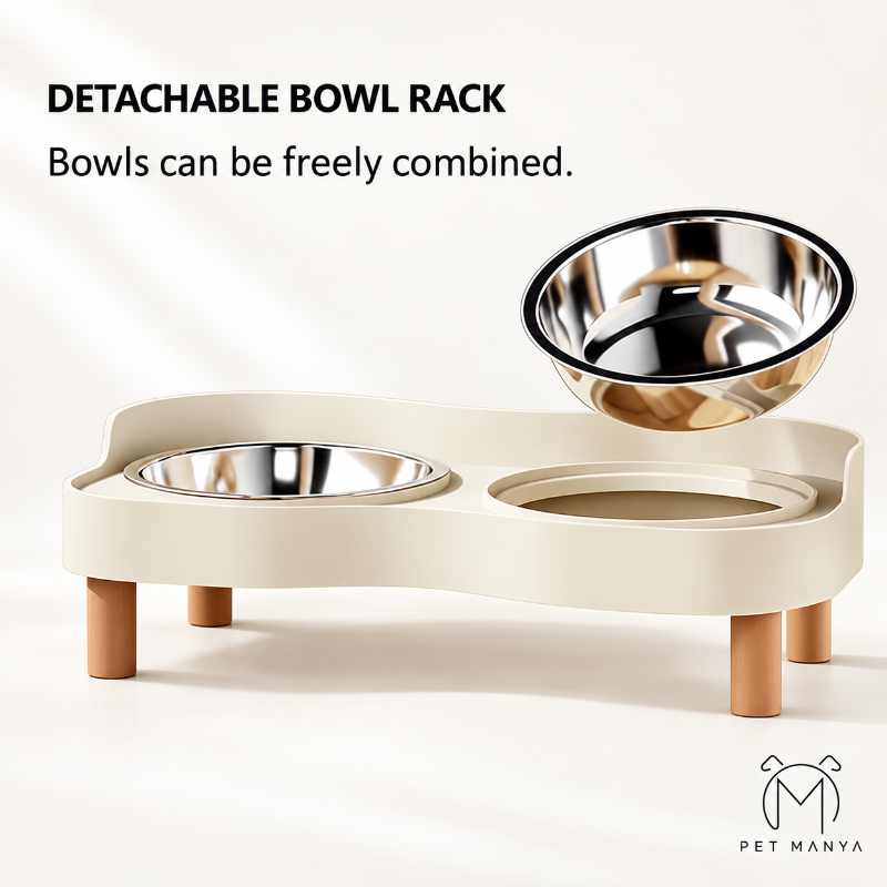 A beige detachable pet feeder stand with two stainless steel bowls and wooden legs, shown on a clean white background with text reading 'DETACHABLE BOWL RACK' and 'Bowls can be freely combined.' A second floating bowl is displayed above the stand.