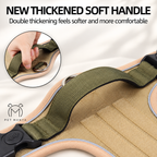 Close-up of a pet harness strap with a thickened soft handle, shown on white fabric with marketing text and a circular inset of a hand demonstrating the handle.