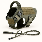 An olive green tactical dog harness with tan webbing panels and a matching coiled leash, shown on a clean white background.