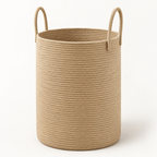 A cylindrical woven rope storage basket in a natural tan color, featuring two loop handles on the sides, set against a plain white background.