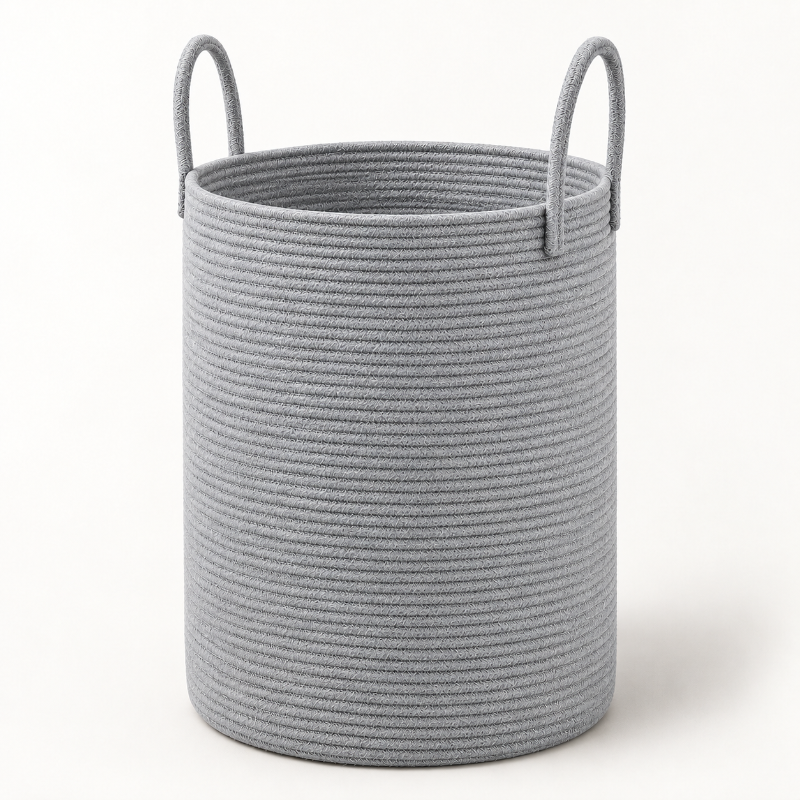 A light gray rope storage basket with two loop handles, shown on a clean white background.