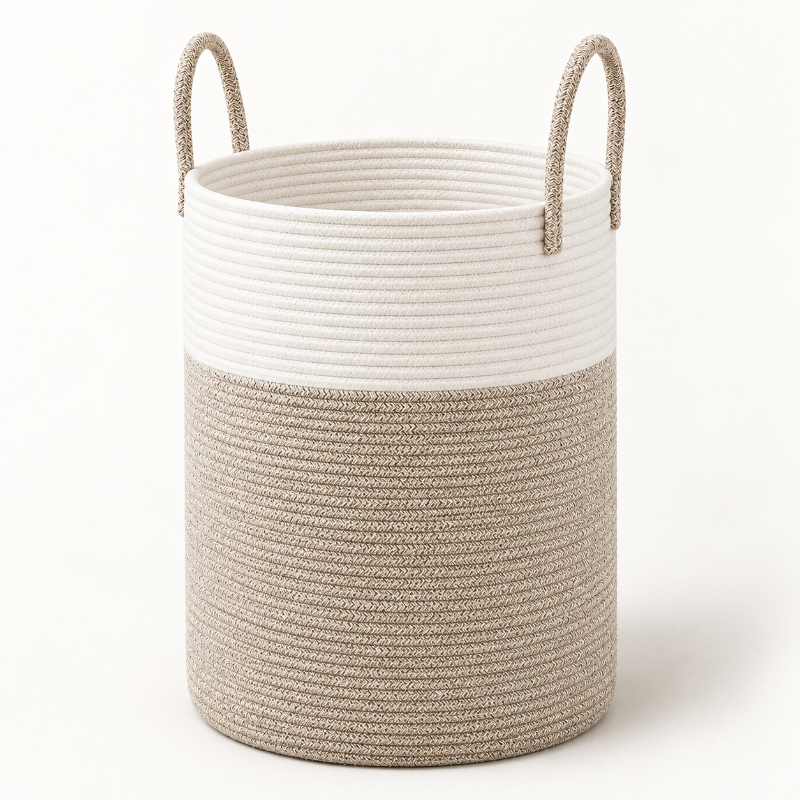 A cylindrical rope storage basket with two loop handles, featuring a two-tone design with a white upper section and a beige lower section, set against a plain white background.