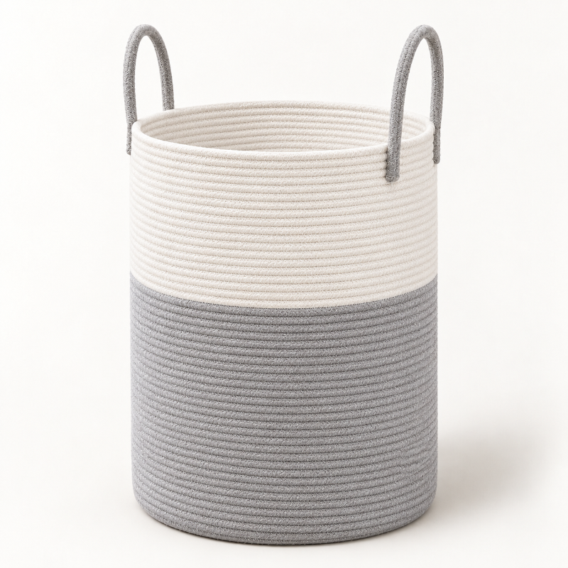 A cylindrical rope storage basket with a two-tone design, featuring a white upper half and a gray lower half, with gray loop handles on a white background.